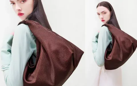 Modella con borsa Borbonese, un tocco di eleganza per le passeggiate a Milano Marittima.