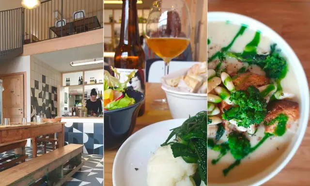 Interno di una trattoria a Rimini centro: tavoli in legno, bancone, insalata, birra e zuppa.