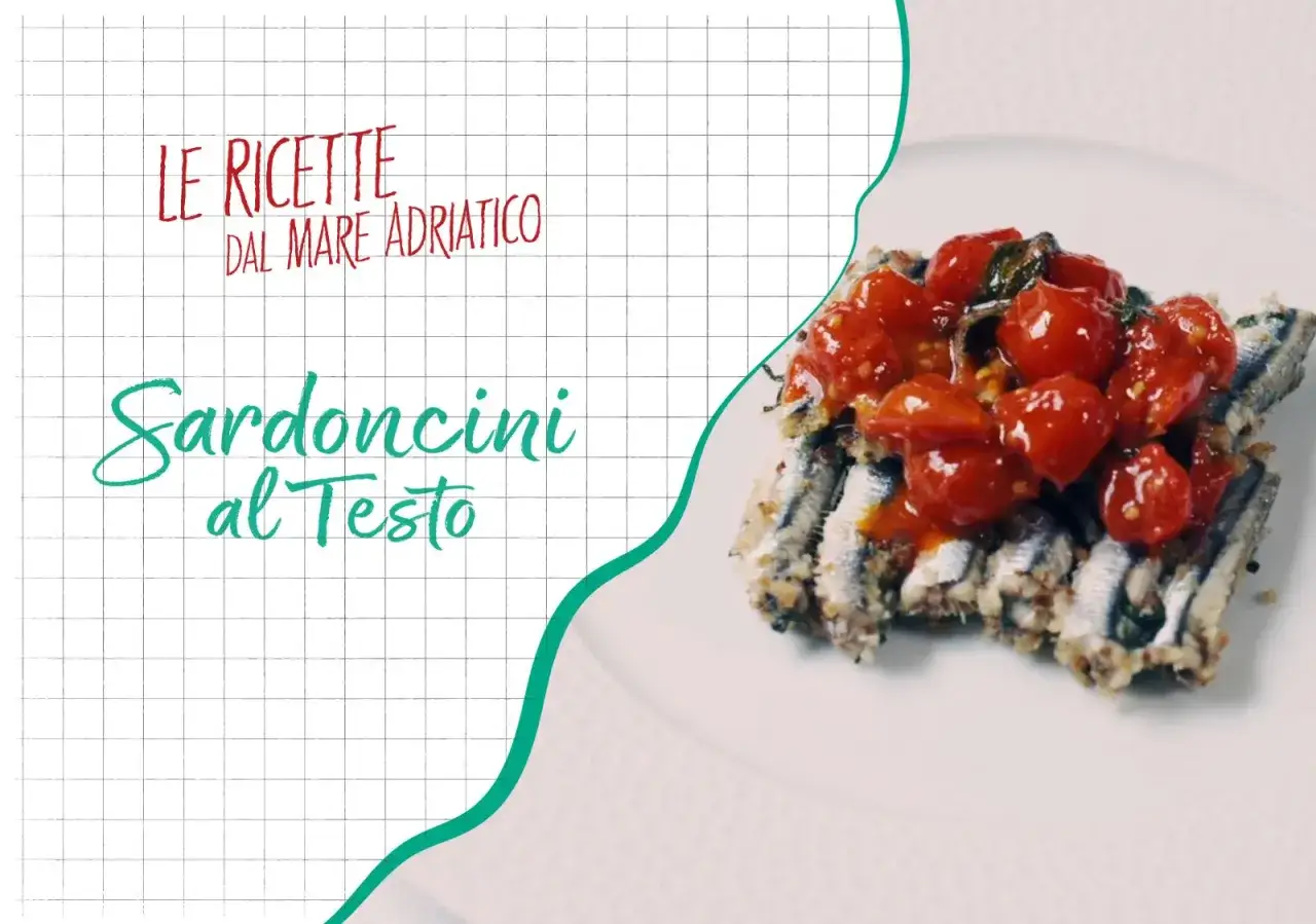 Sardoncini al testo, un piatto gustoso con pomodorini freschi, direttamente dalle ricette del Mare Adriatico.
